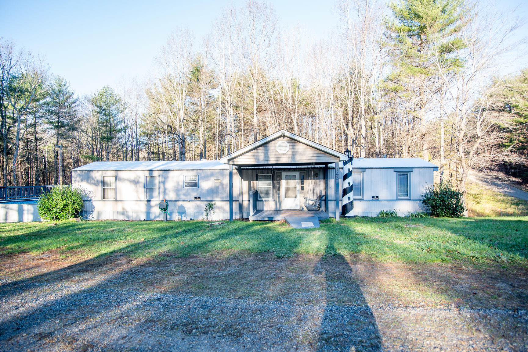 143 Sunset Ridge Road Callaway, VA 24067 - Photo 11 of 42 a view of a house with a yard and hanging chair