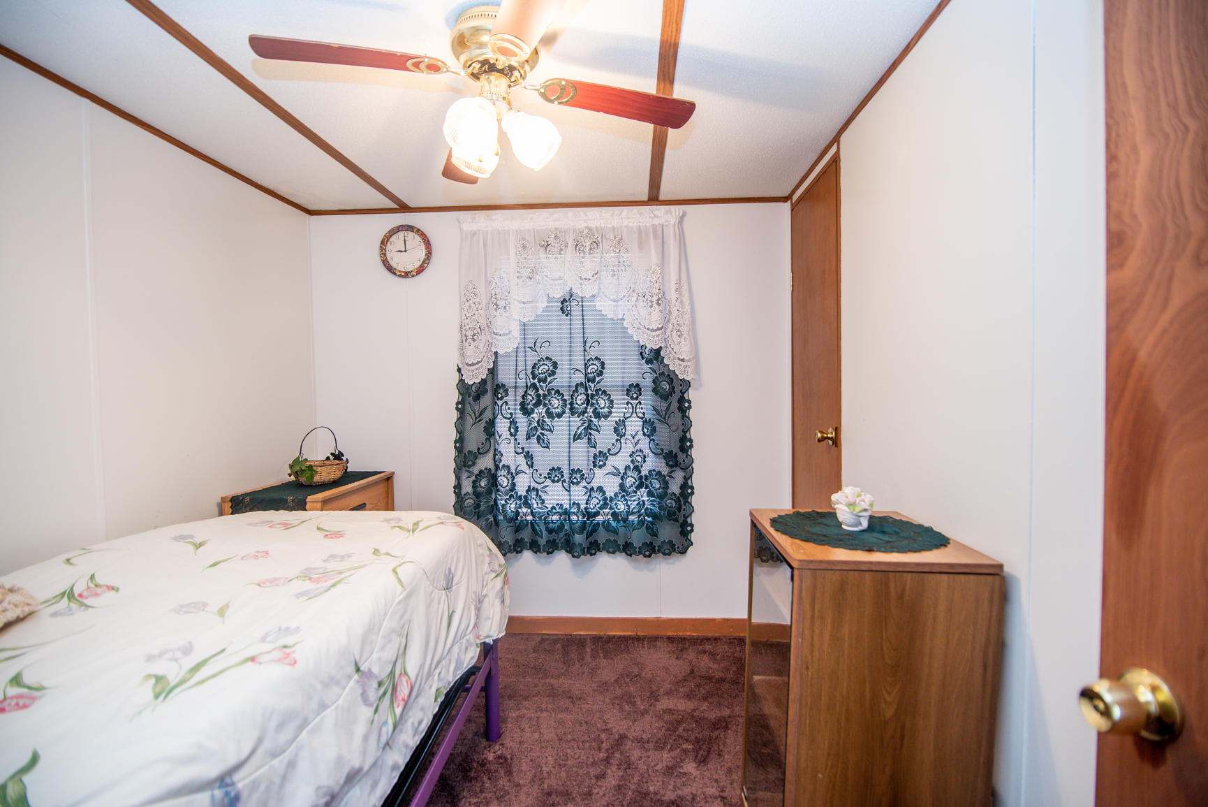 143 Sunset Ridge Road Callaway, VA 24067 - Photo 21 of 42 a bedroom with a bed and a window