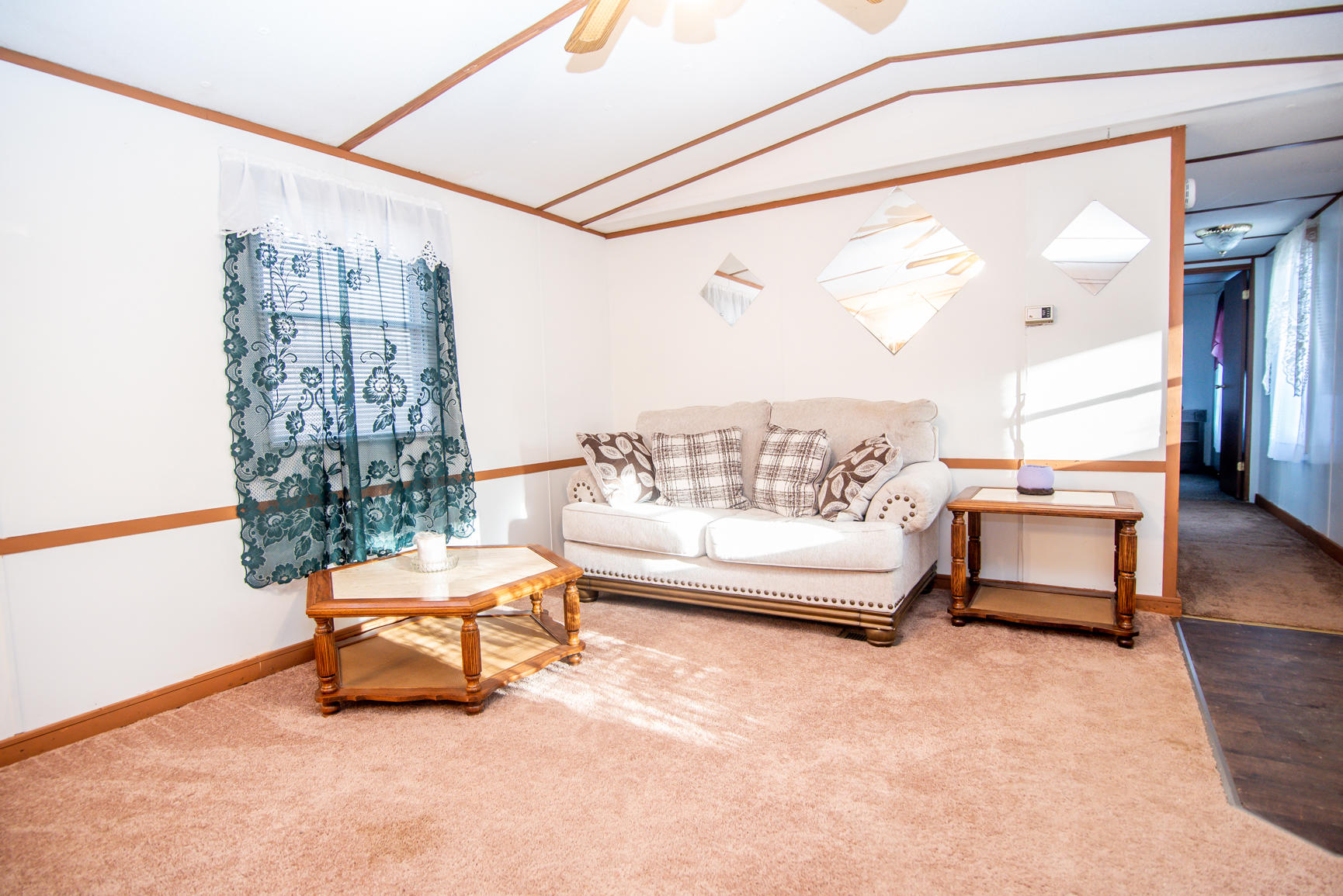 143 Sunset Ridge Road Callaway, VA 24067 - Photo 27 of 42 a living room with furniture and a large window