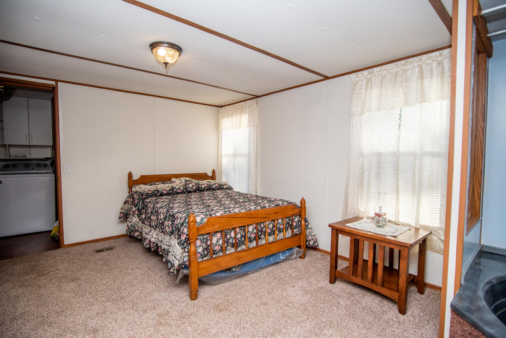 143 Sunset Ridge Road Callaway, VA 24067 - Photo 34 of 42 a bedroom with a bed and a window