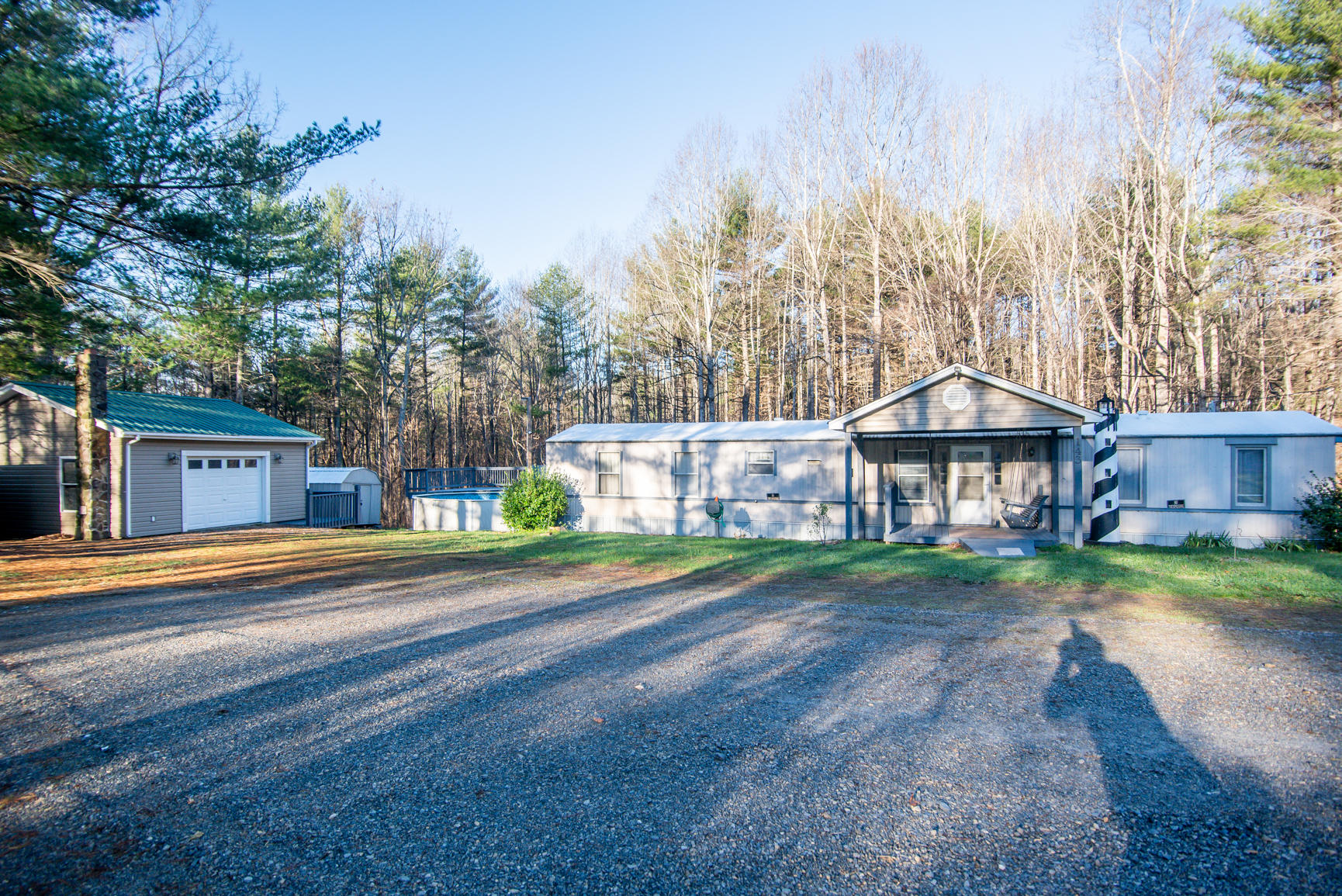 143 Sunset Ridge Road Callaway, VA 24067 - Photo 10 of 42 a front view of a house with a yard and trees