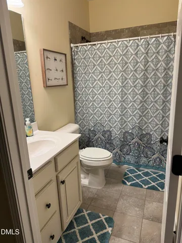 a view of a chairs and table on the deck