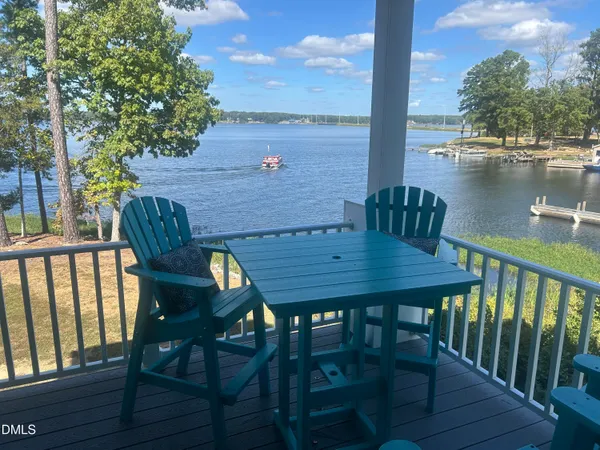 a view of a balcony with chairs