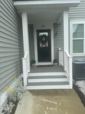 a bathroom with a glass door