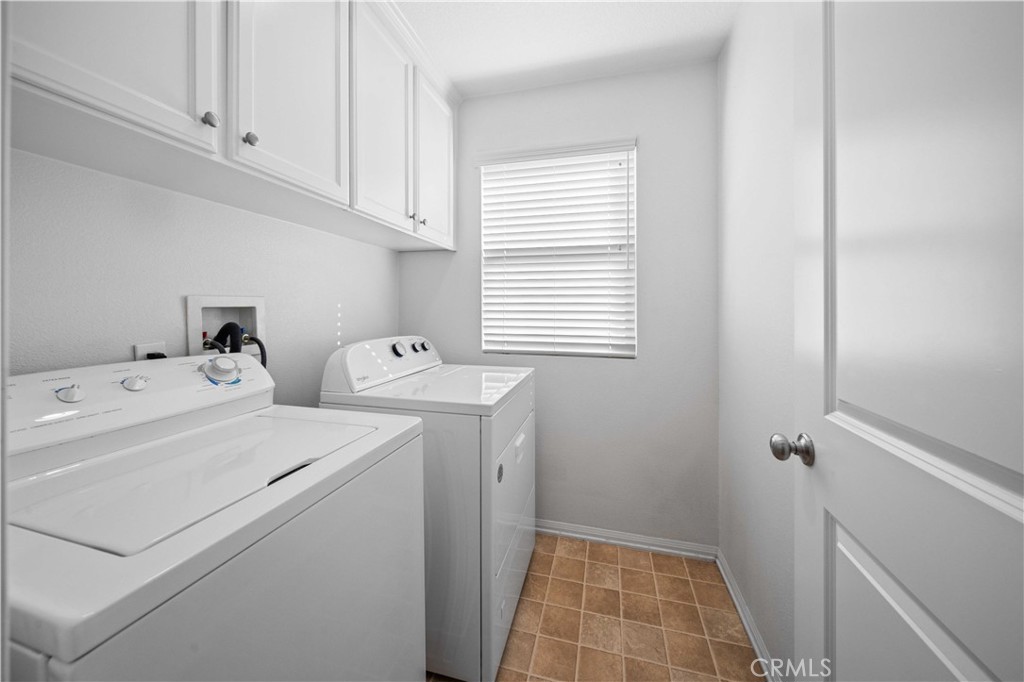9352 Condor Court Pacoima, CA 91331 - Photo 14 of 23 a utility room with dryer and washer