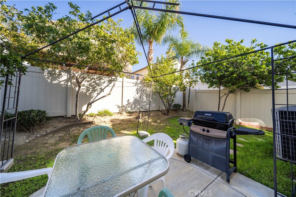9352 Condor Court Pacoima, CA 91331 - Photo 18 of 23 a view of a backyard with plants garden and furniture