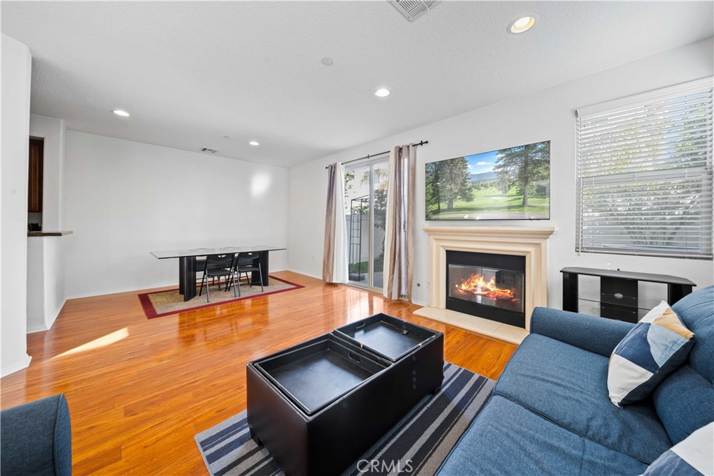 9352 Condor Court Pacoima, CA 91331 - Photo 6 of 23 a living room with furniture and a fireplace