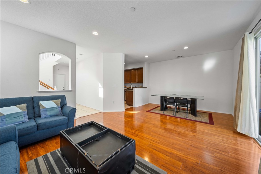 9352 Condor Court Pacoima, CA 91331 - Photo 8 of 23 a living room with furniture and a wooden floor
