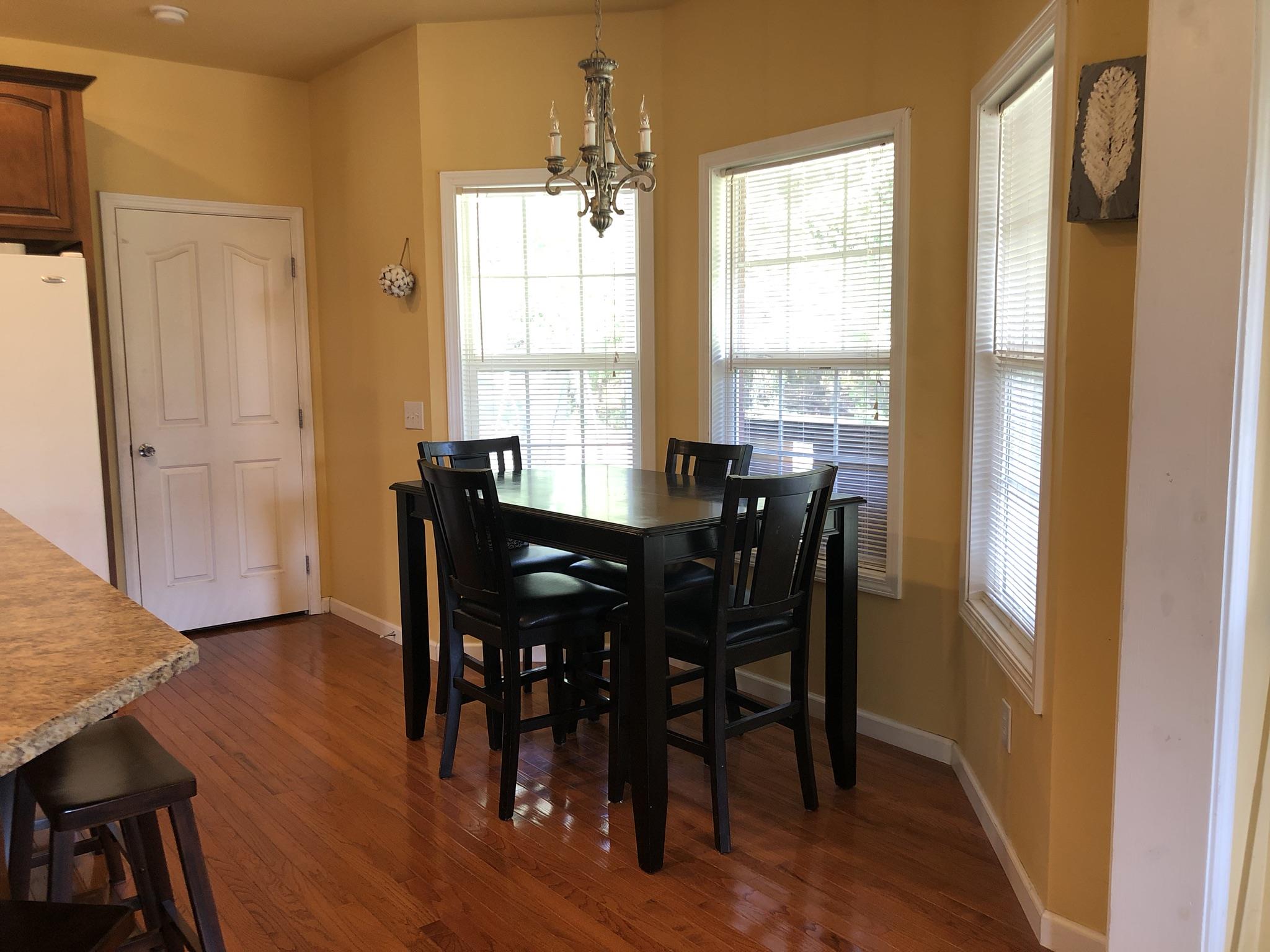 3046 Wayside Road Manchester, TN 37355 - Photo 11 of 30 a view of a dining room with furniture and window