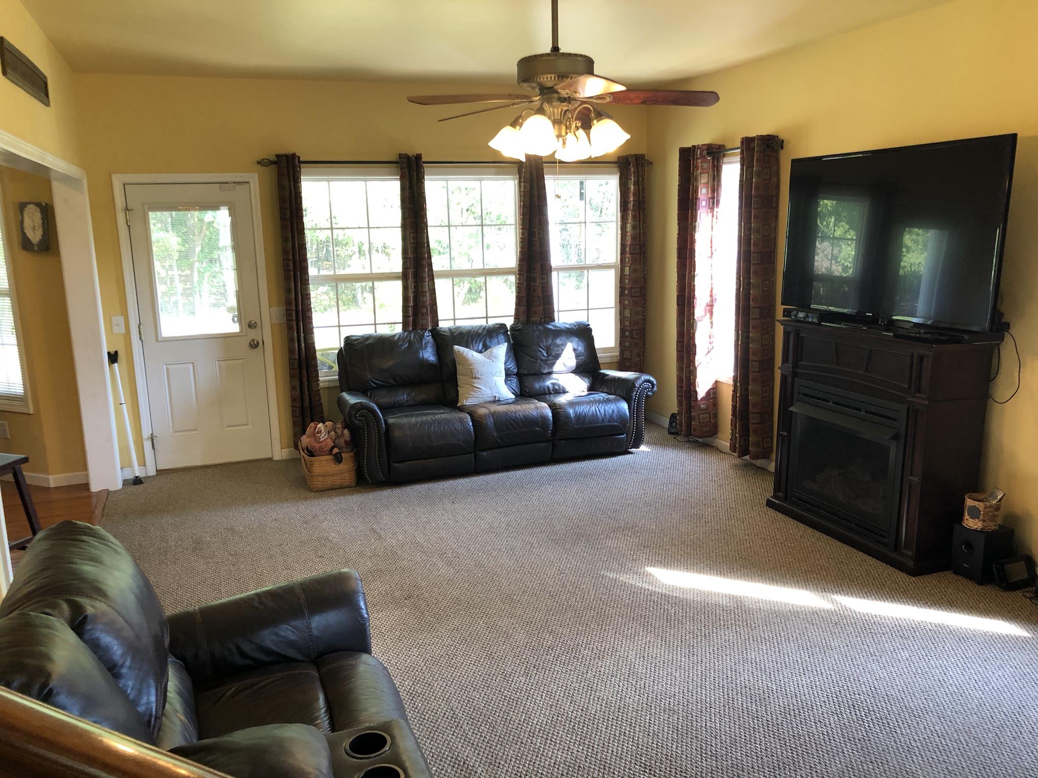 3046 Wayside Road Manchester, TN 37355 - Photo 6 of 30 a living room with furniture windows and a flat screen tv