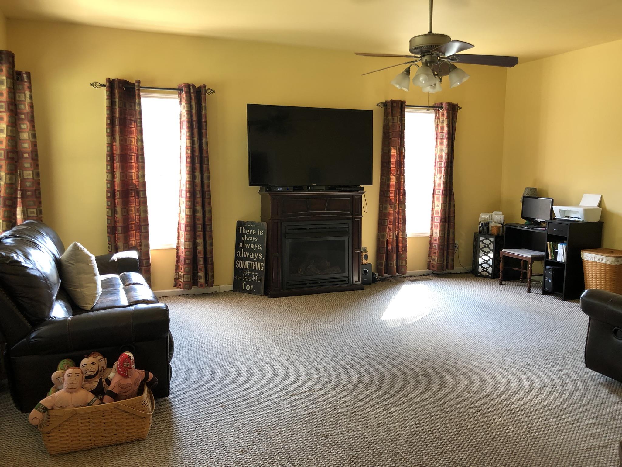 3046 Wayside Road Manchester, TN 37355 - Photo 8 of 30 a living room with furniture and a flat screen tv