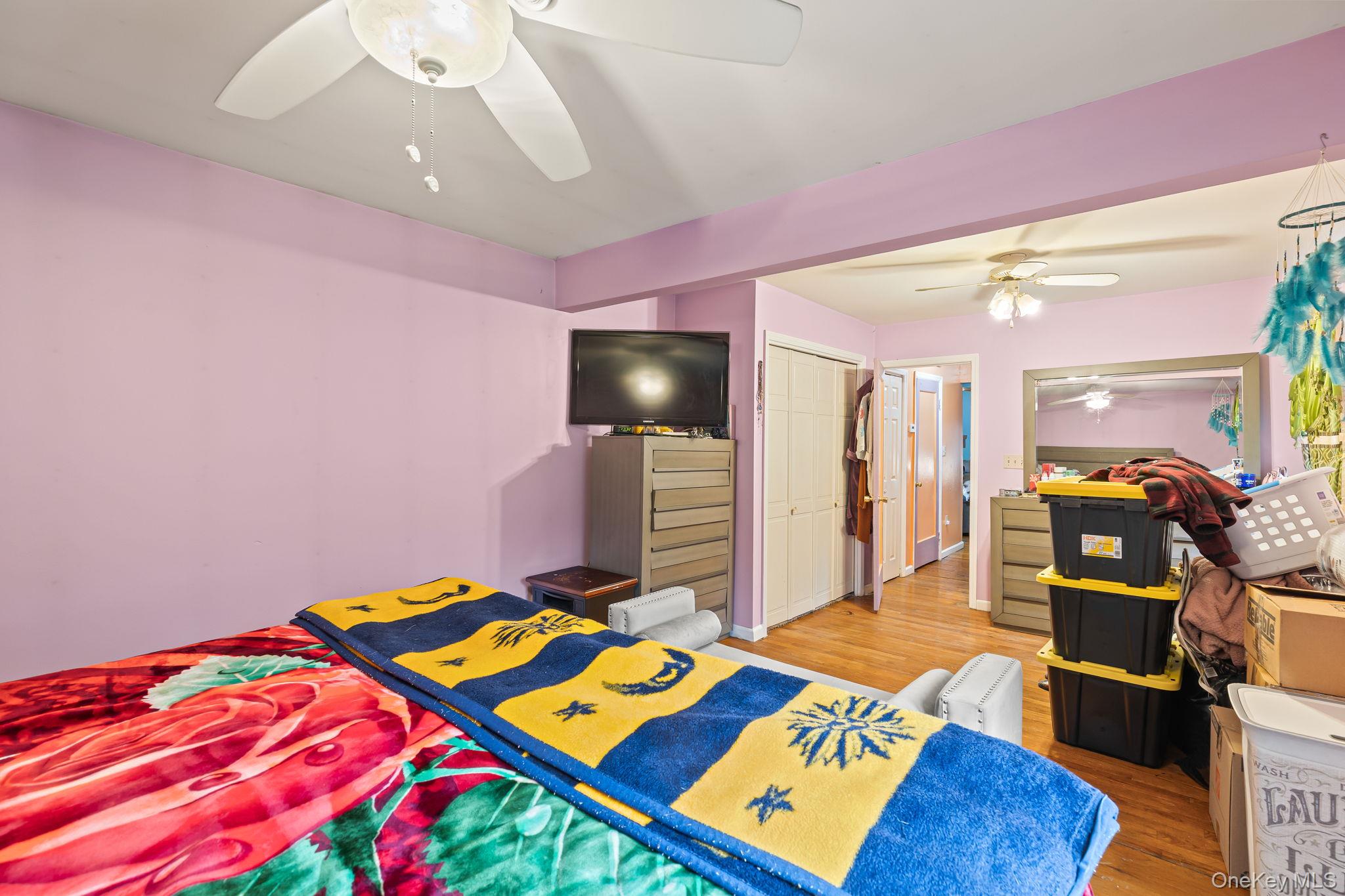 11 Cross Creek Road Cold Spring, NY 10516 - Photo 22 of 43 Bedroom featuring light wood-style floors, a closet, and ceiling fan