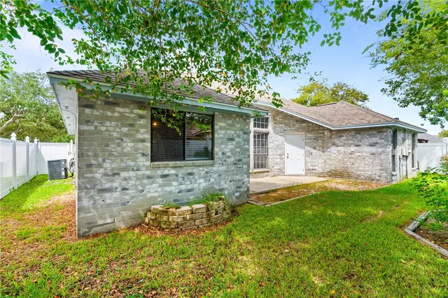 a backyard of a house with seating space