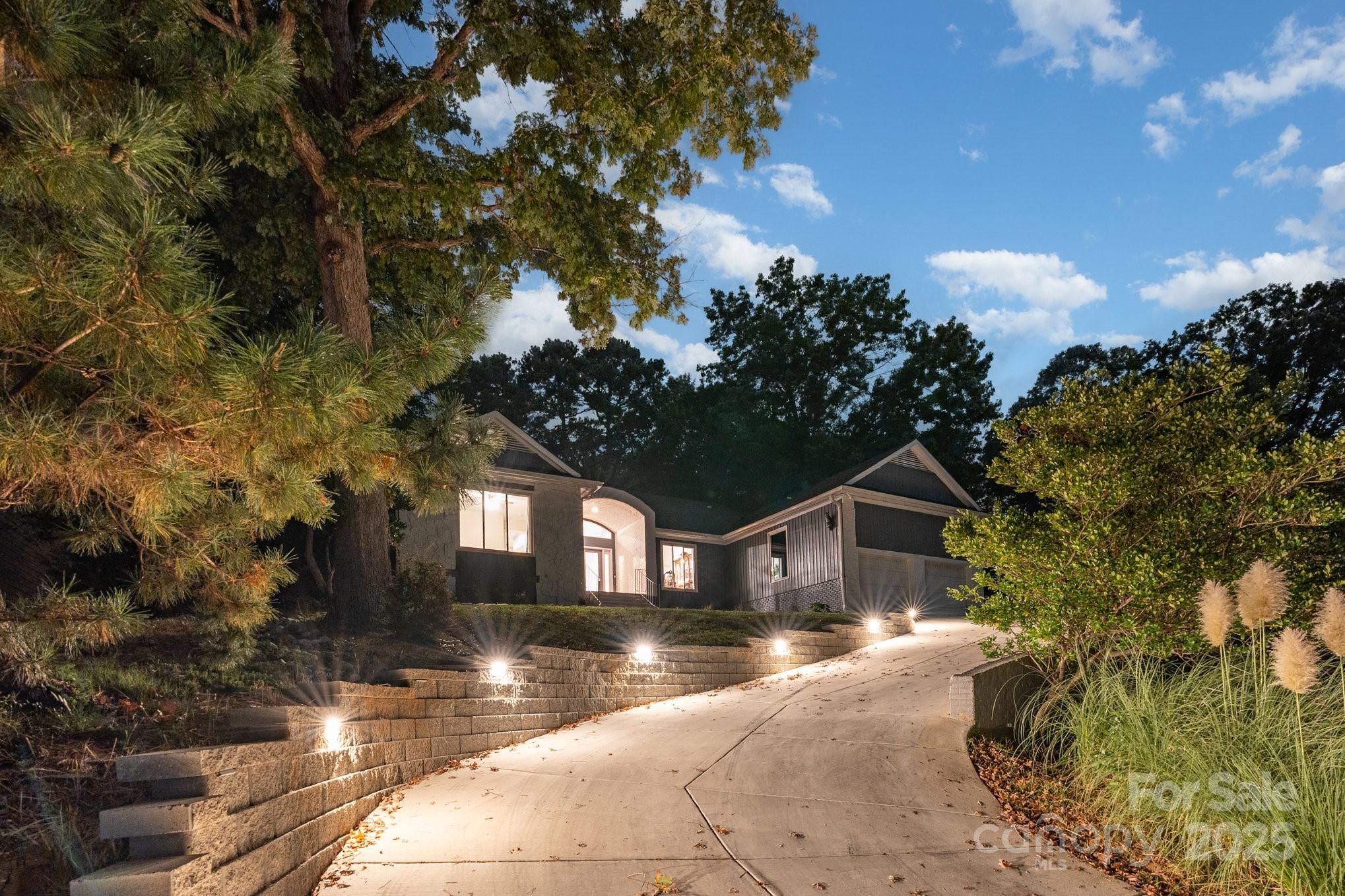 7042 Chelsea Day Lane Tega Cay, SC 29708 - Photo 38 of 40 a front view of a house with a yard