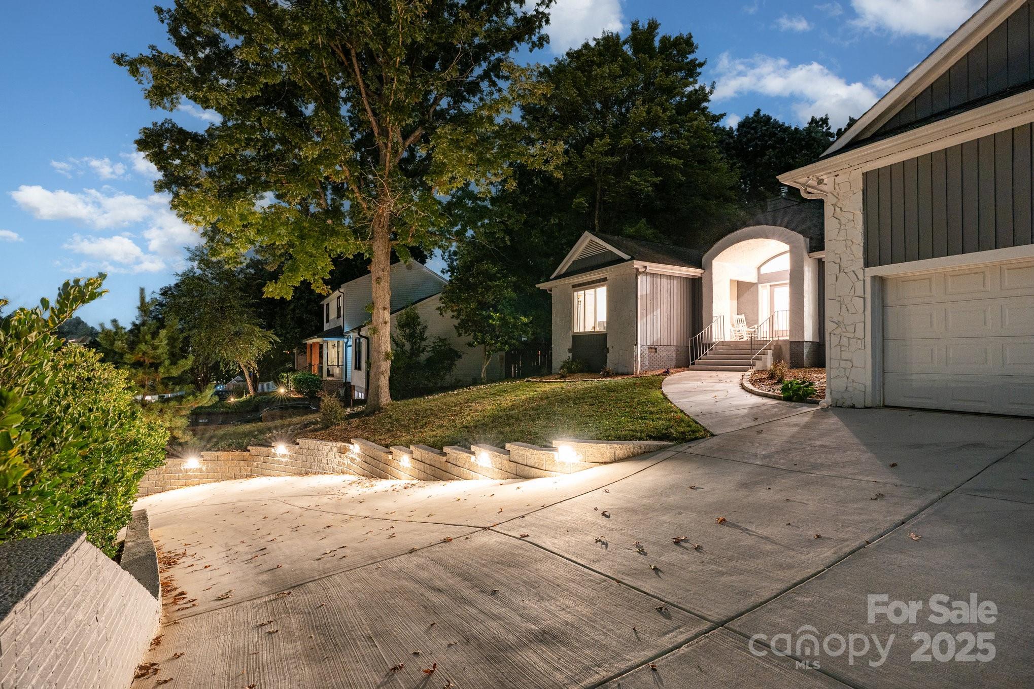 7042 Chelsea Day Lane Tega Cay, SC 29708 - Photo 39 of 40 a view of a house with a yard