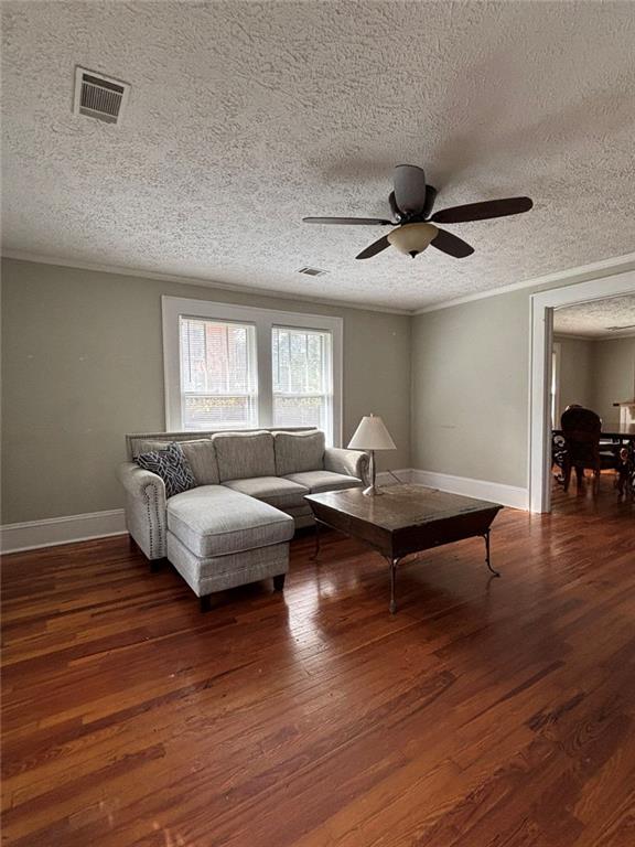 332 Carr Street Athens, GA 30605 - Photo 2 of 8 a living room with furniture and wooden floor