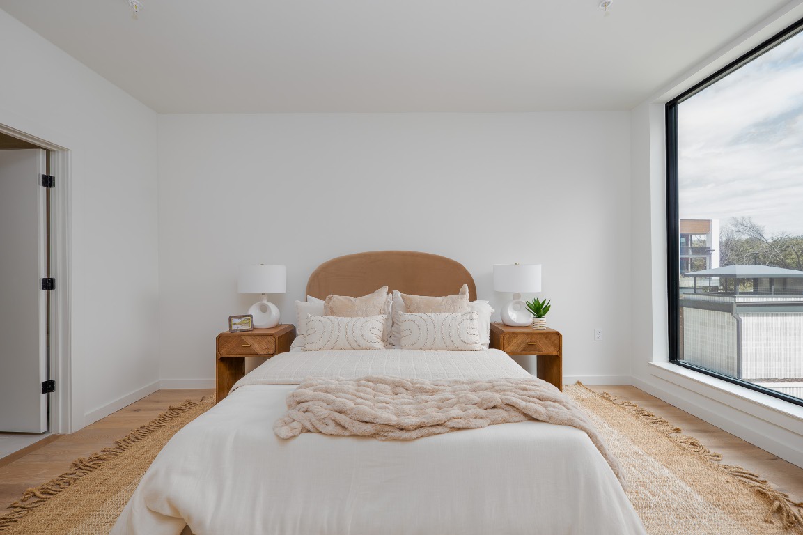 2209 South 1st Street, Unit 334 Austin, TX 78704 - Photo 11 of 28 a bedroom with a bed and window
