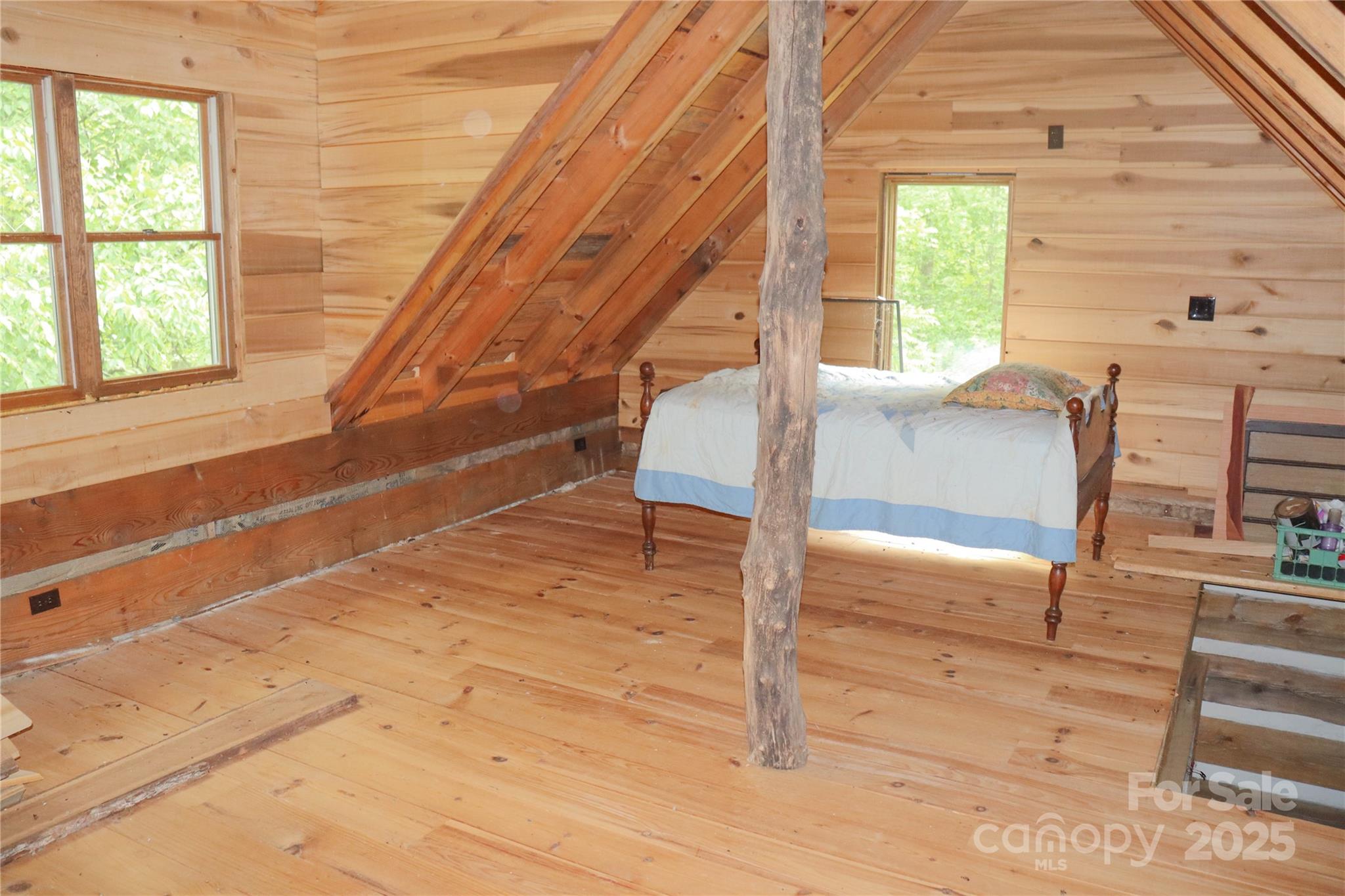 459 Old Yellow Mountain Road Marion, NC 28752 - Photo 17 of 28 a view of entryway and hall with wooden floor