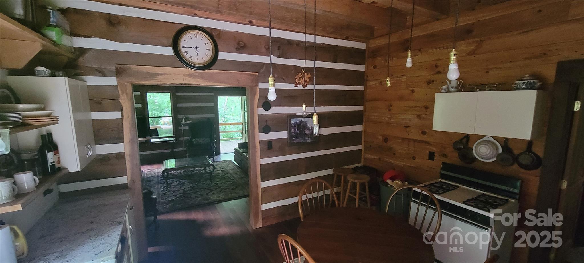 459 Old Yellow Mountain Road Marion, NC 28752 - Photo 21 of 28 a kitchen with a stove and a microwave