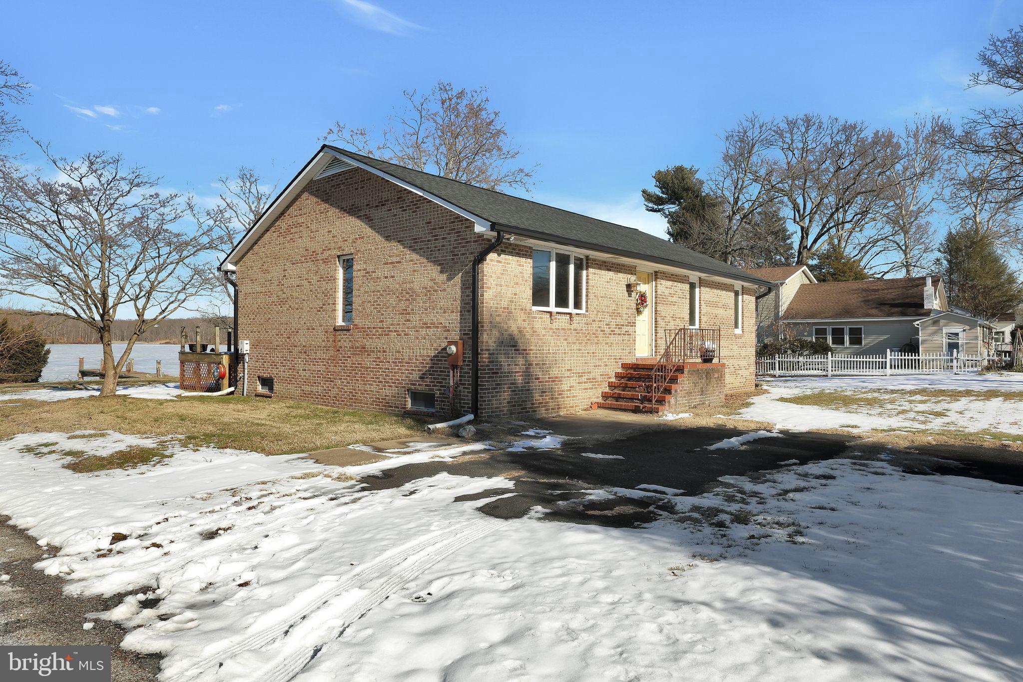 6600 Blackhead Road Baltimore, MD 21220 - Photo 1 of 39 a front view of a house with a yard