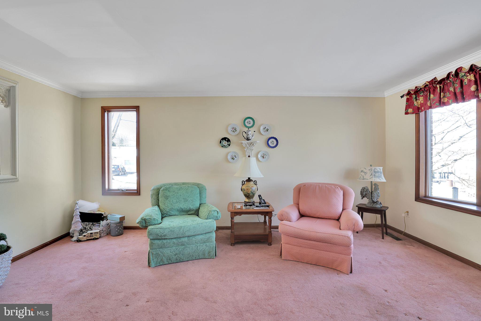 6600 Blackhead Road Baltimore, MD 21220 - Photo 29 of 39 a living room with furniture and a window