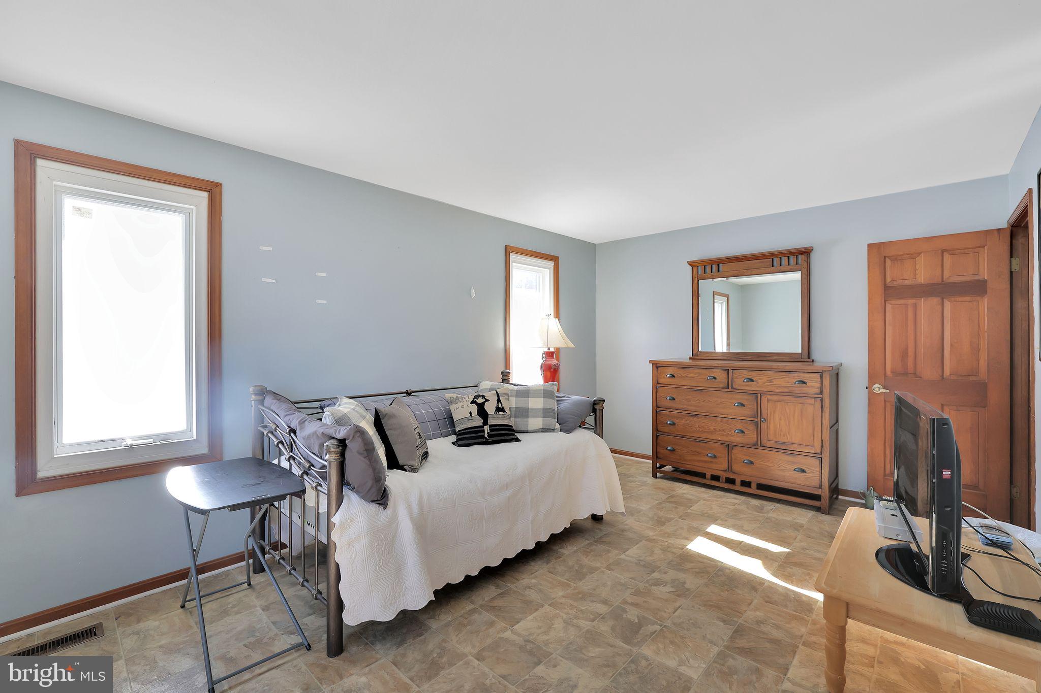 6600 Blackhead Road Baltimore, MD 21220 - Photo 39 of 39 a bedroom with bed and window