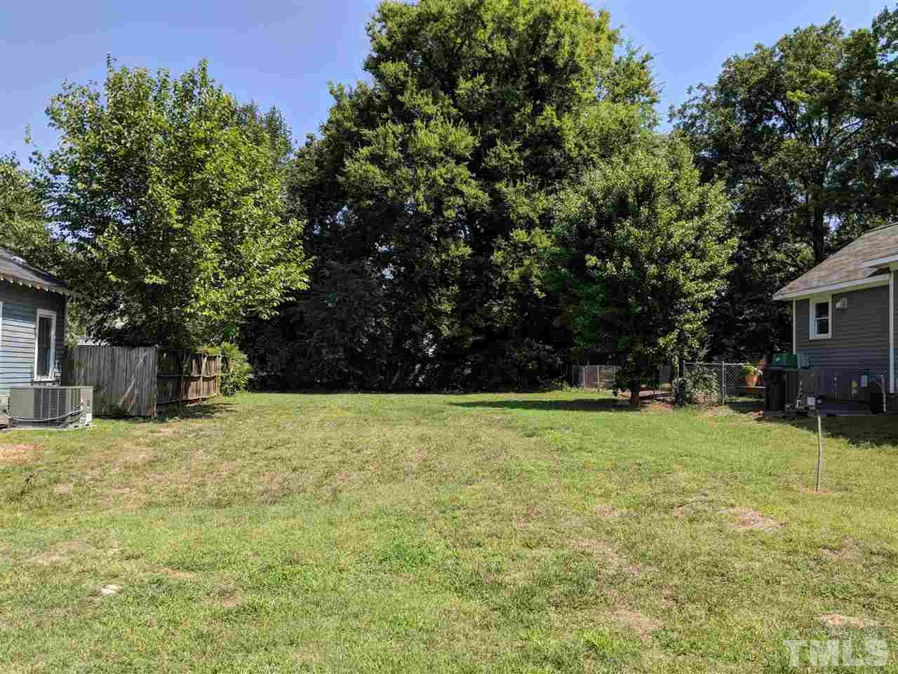 711 Holden Street Raleigh, NC 27604 - Photo 1 of 1 a house with trees in the background