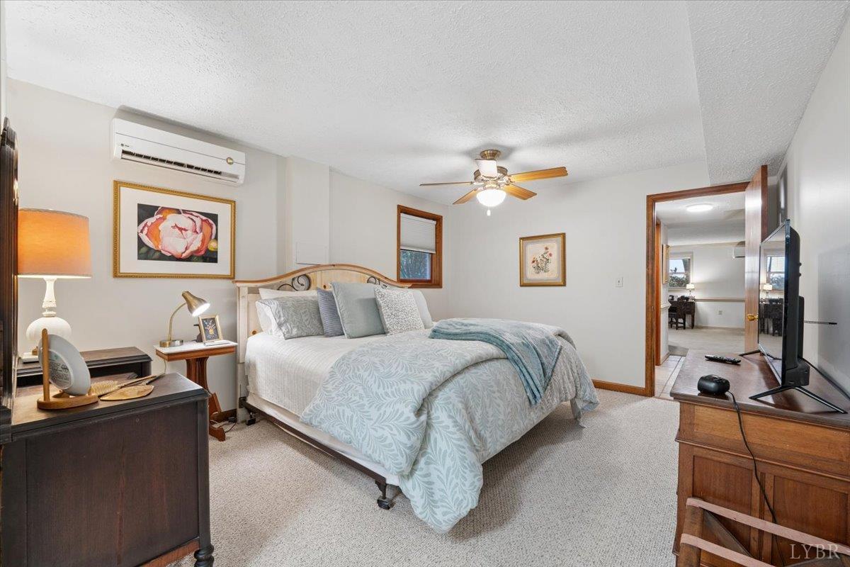 3289 Peaks Road Bedford, VA 24523 - Photo 52 of 71 a bedroom with a bed and furniture