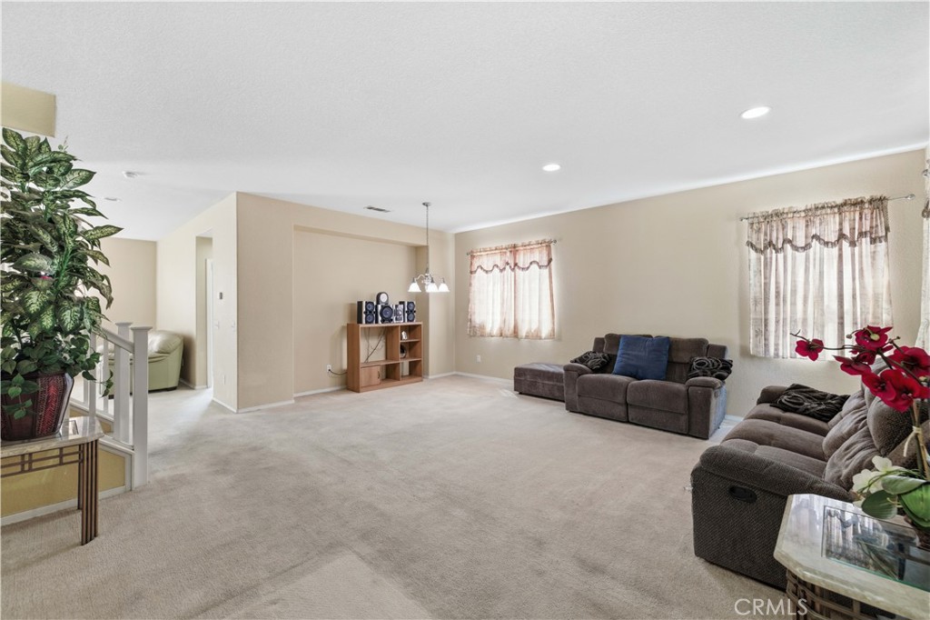 2822 Emerald Lane Lancaster, CA 93535 - Photo 3 of 29 a living room with furniture and a window