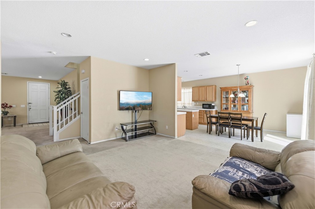 2822 Emerald Lane Lancaster, CA 93535 - Photo 7 of 29 a living room with furniture and a table