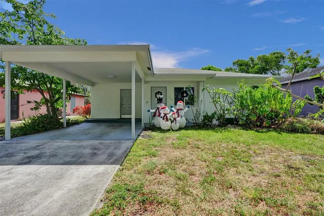 a front view of house with outdoor space