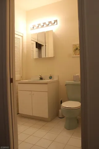 a bathroom with a toilet and a sink