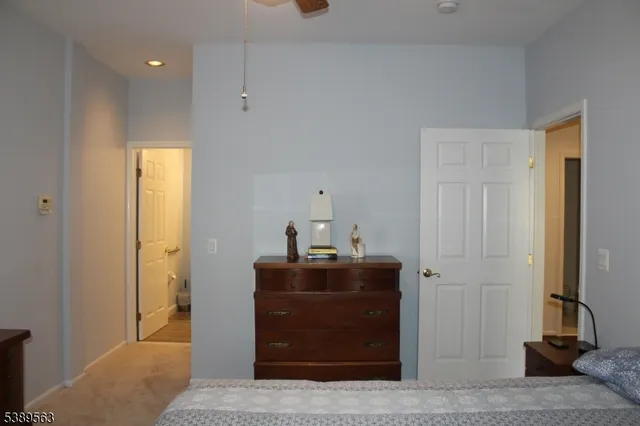 a view of a hallway with closet
