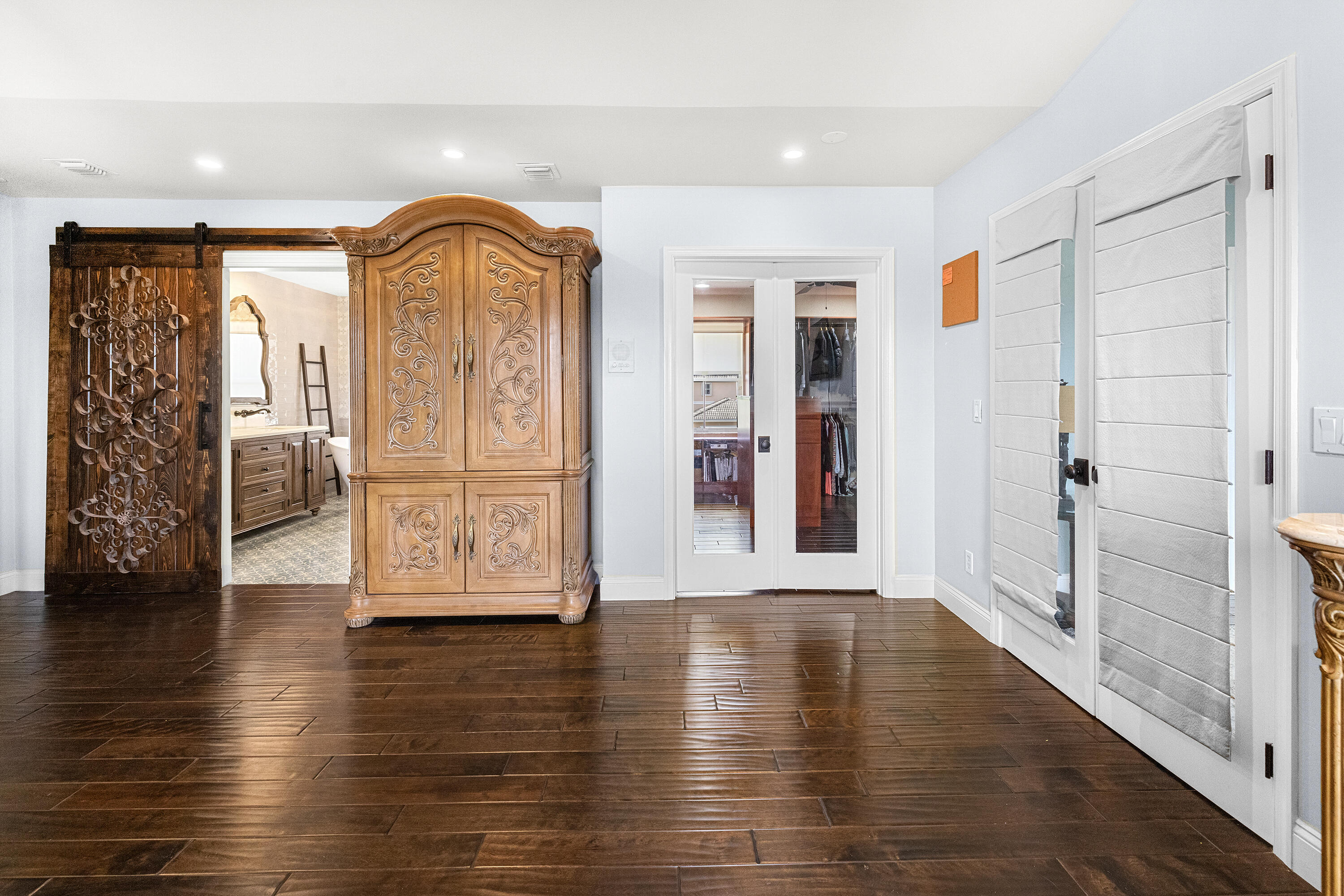 6575 Spring Meadow Drive Greenacres, FL 33413 - Photo 20 of 51 a view of an entryway with wooden floor