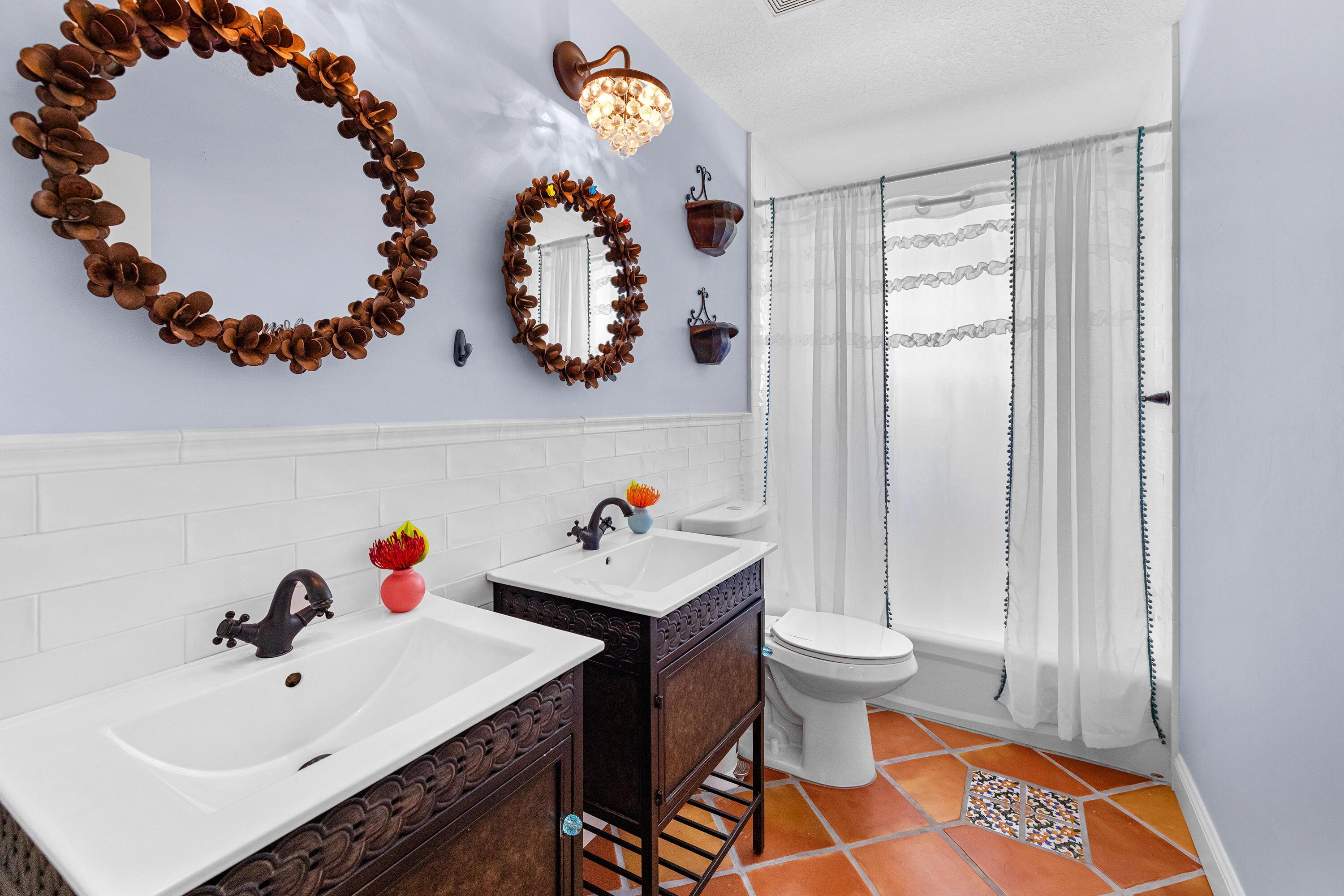 6575 Spring Meadow Drive Greenacres, FL 33413 - Photo 28 of 51 a bathroom with a sink mirror and toilet