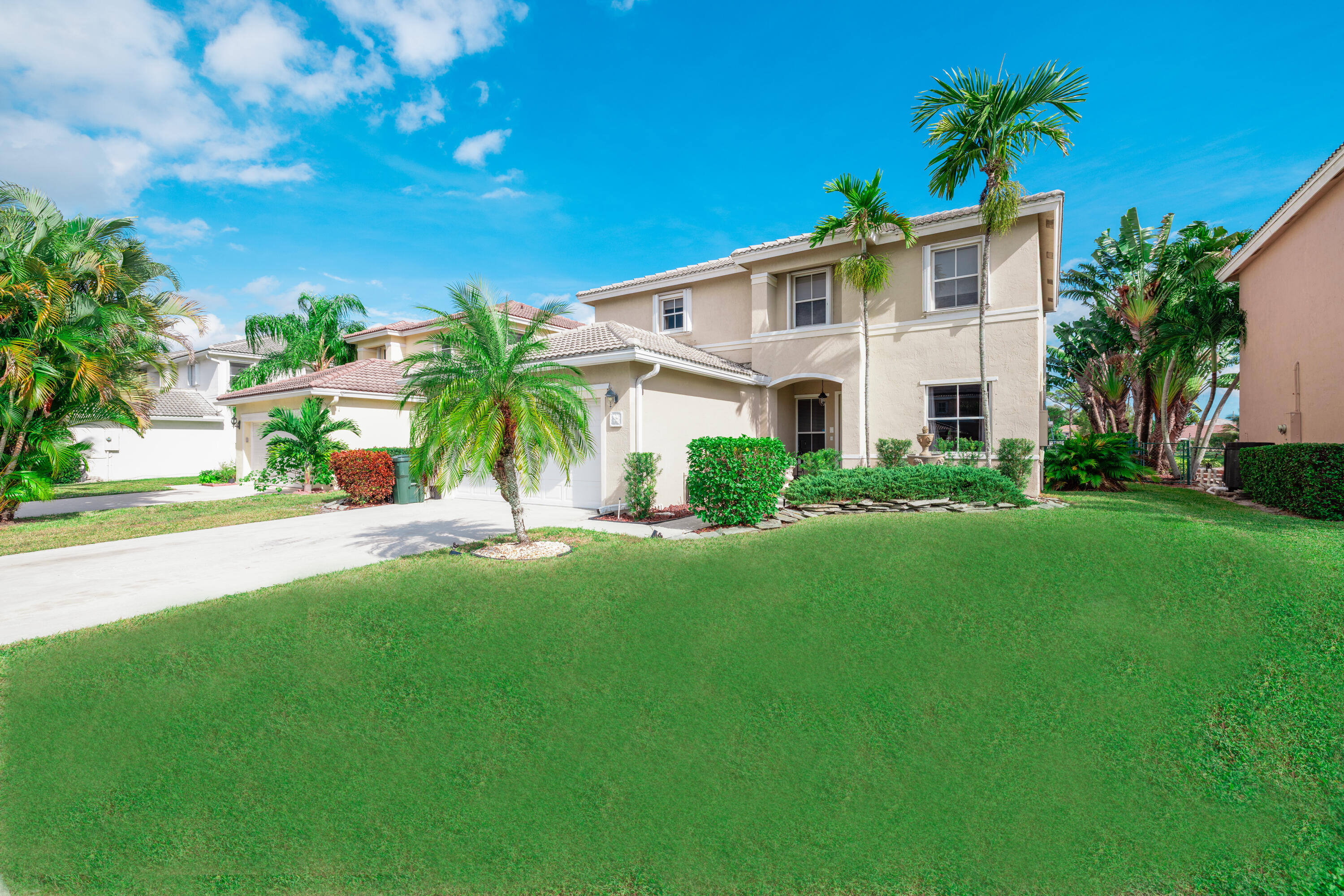 6575 Spring Meadow Drive Greenacres, FL 33413 - Photo 43 of 51 a view of a house with a backyard