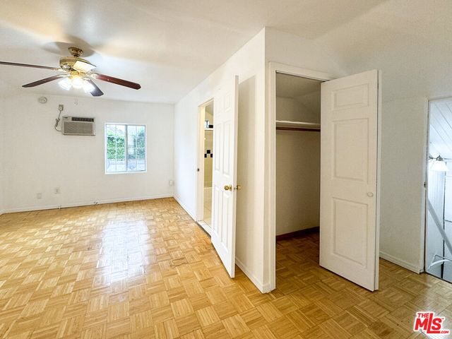 a bathroom with a toilet a sink and shower