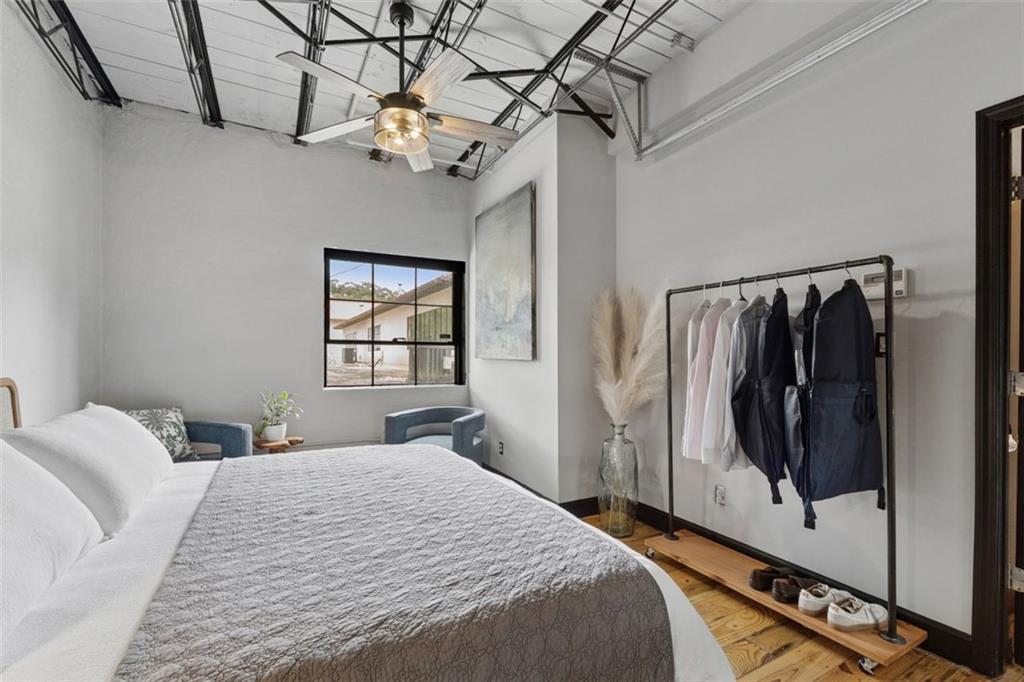 830 DeKalb Avenue Northeast, Unit 11 Atlanta, GA 30307 - Photo 21 of 37 a bedroom with a bed and a window
