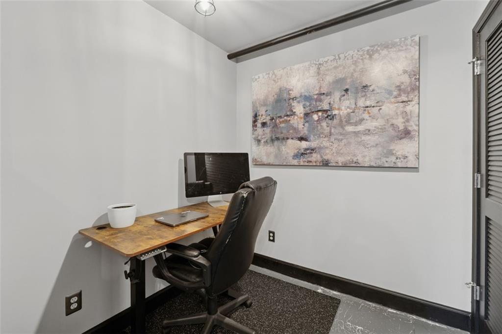 830 DeKalb Avenue Northeast, Unit 11 Atlanta, GA 30307 - Photo 29 of 37 a view of a workspace with furniture and a window