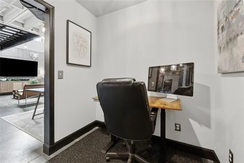 a kitchen with stainless steel appliances granite countertop a refrigerator and a counter