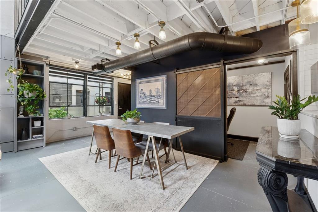 830 DeKalb Avenue Northeast, Unit 11 Atlanta, GA 30307 - Photo 5 of 37 a view of a dining room with furniture window and outside view