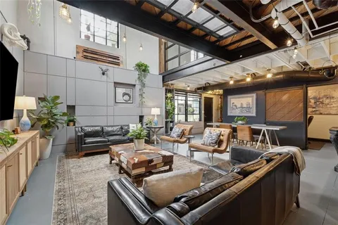 a outdoor space with lots of table and chairs