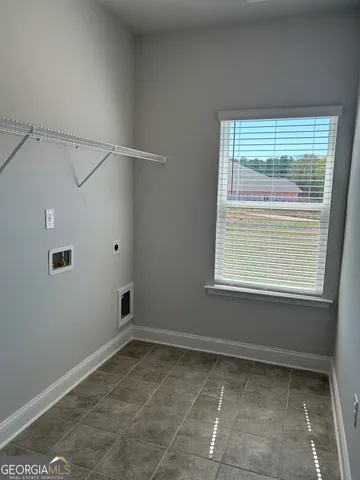 a view of a room that has a window in it