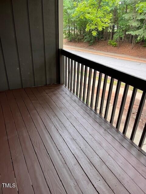 4225 Greencastle Court, Unit D Raleigh, NC 27604 - Photo 11 of 13 a view of balcony with wooden floor