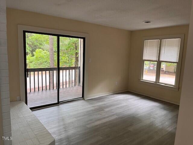 4225 Greencastle Court, Unit D Raleigh, NC 27604 - Photo 2 of 13 a view of a room with large windows