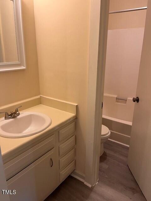 4225 Greencastle Court, Unit D Raleigh, NC 27604 - Photo 7 of 13 a bathroom with a sink and a toilet