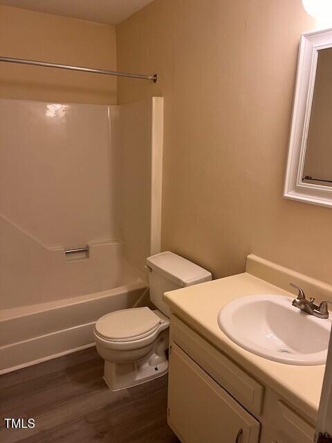 4225 Greencastle Court, Unit D Raleigh, NC 27604 - Photo 10 of 13 a bathroom with a sink toilet and shower
