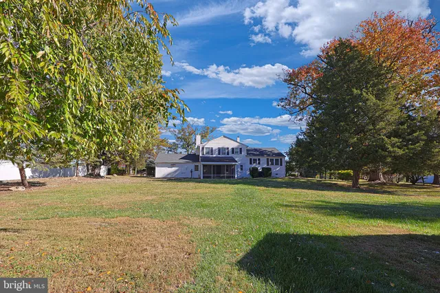 a view of a house with a big yard