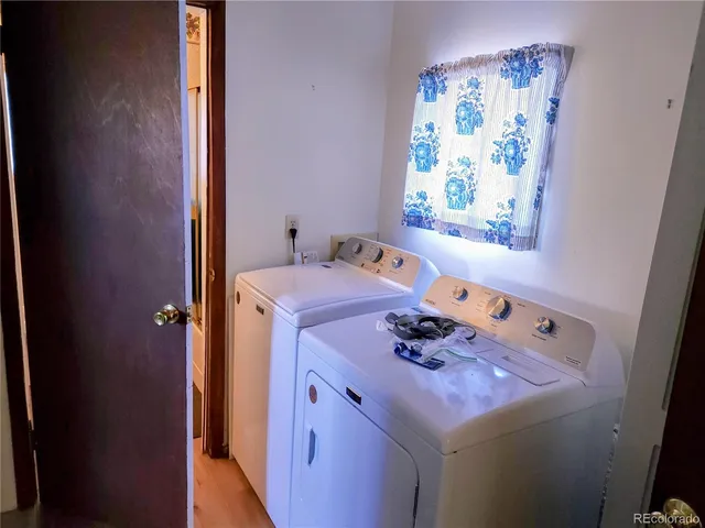 a view of a yard in front of the house