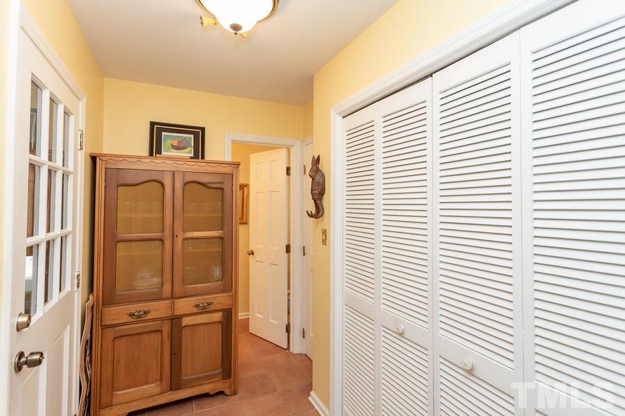 8609 Seagate Drive Raleigh, NC 27615 - Photo 11 of 28 You will find the washer, dryer and 1/2 bath here. Fabulous back steps to enormous bonus room. Enter huge garage with additional work space